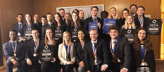 Well dressed winners of the 2018 DECA Collegiate Entrepreneurship Cluster Awards