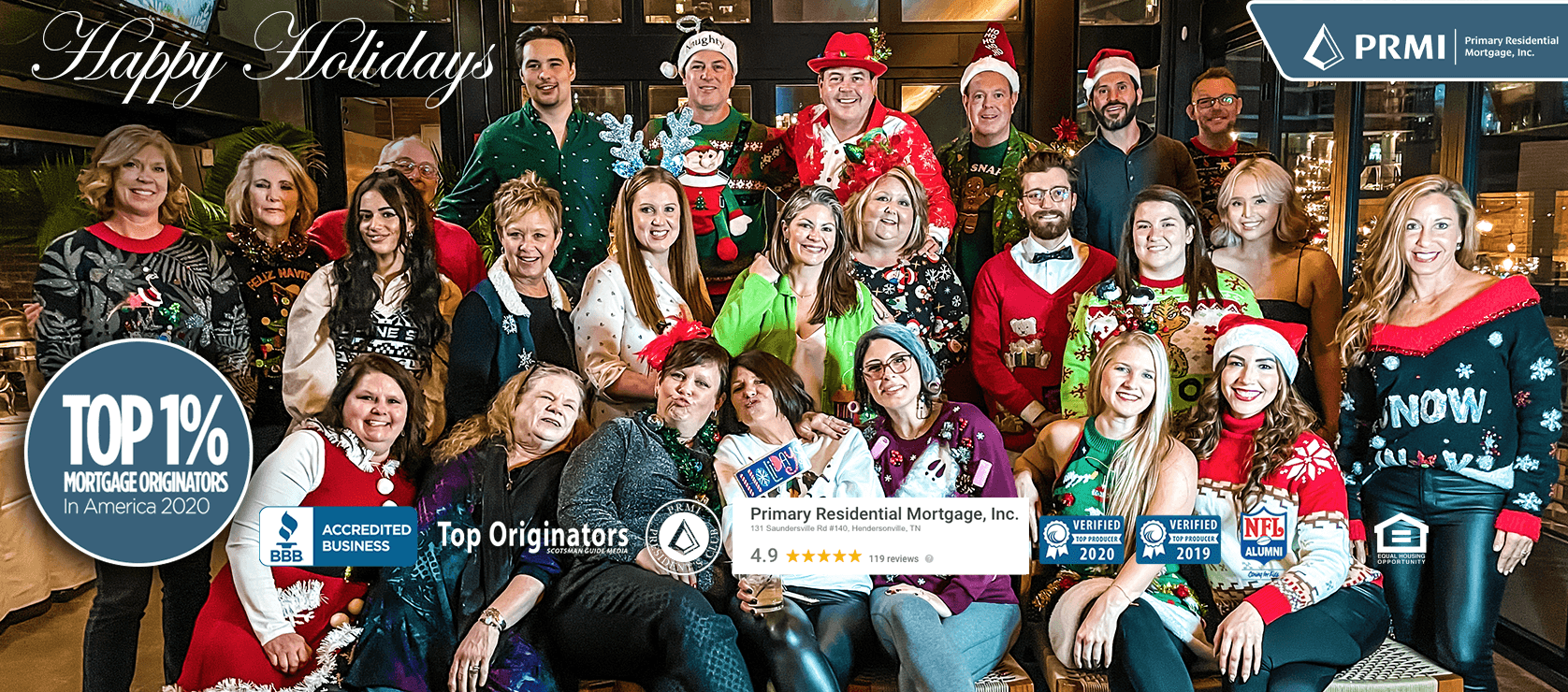 PRMI christmas group photo wearing festive clothing at the annual Christmas party